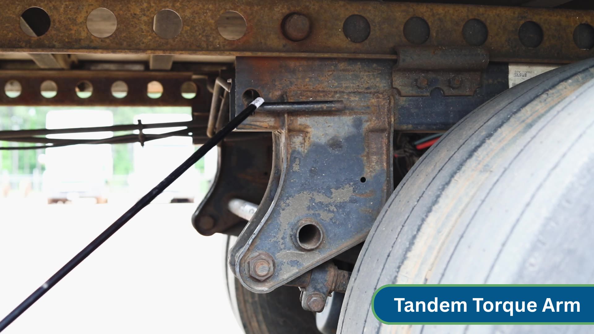 tandem torque arm under semi cab