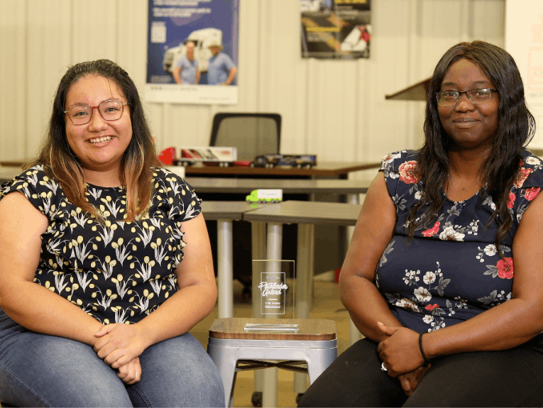 Emily Eaves and Camille Eaves, pathfinder awards recipients sitting in a classroom